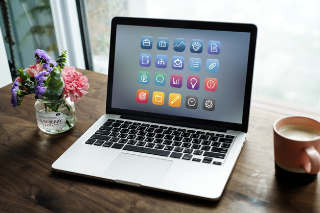 Laptop on a wooden table